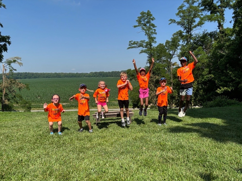 Summer camp kids enjoying outdoor activities at Alphabet Academy